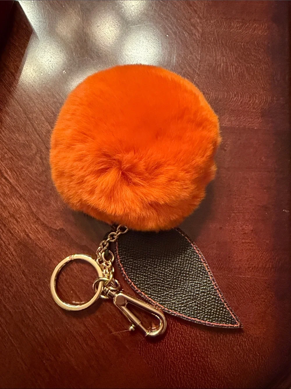 Dolce & Gabbana Orange  Mink Fur Pom-Pom Keychain with Black Leaf Accent
